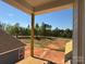 An expansive view from a home porch, showcasing a verdant tree line and landscape at 7459 Fighting Creek Rd # 33, Sherrills Ford, NC 28673