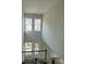 Bright view down to the staircase, featuring an abundance of natural light at 7459 Fighting Creek Rd # 33, Sherrills Ford, NC 28673