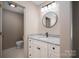 A bathroom features a modern vanity, stylish mirror and good natural light at 102 3Rd Se Ave, Catawba, NC 28609
