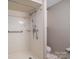 The accessible bathroom features grab bars and a shower seat at 102 3Rd Se Ave, Catawba, NC 28609