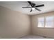 This bedroom is bright with neutral walls, carpet, and a ceiling fan at 102 3Rd Se Ave, Catawba, NC 28609