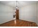 Dining room with hardwood floors and neutral wall color, perfect for entertaining guests at 102 3Rd Se Ave, Catawba, NC 28609