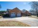 Well maintained brick home with a driveway and landscaping at 102 3Rd Se Ave, Catawba, NC 28609