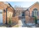 Elegant brick home with a gated entrance leading to a well-manicured front yard at 102 3Rd Se Ave, Catawba, NC 28609