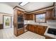 Kitchen with granite counters, tile backsplash, stainless steel oven, and bright sunlight at 102 3Rd Se Ave, Catawba, NC 28609