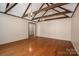 Spacious living room with hardwood floors, exposed beams, and ample natural light at 102 3Rd Se Ave, Catawba, NC 28609