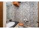 Fun powder room with unique wallpaper, classic fixtures, and small vanity for added convenience at 102 3Rd Se Ave, Catawba, NC 28609