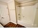 Bathroom with a standard shower and vinyl floors at 1146 Crestmont Se Dr, Concord, NC 28025