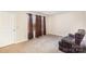 Cozy living room with neutral carpet, curtains, and comfortable seating; a relaxing space at 11918 Crabapple Ln, Huntersville, NC 28078