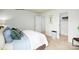 Bright bedroom with neutral walls, large window, closet, and modern decor at 1348 Secrest Commons Dr, Monroe, NC 28112