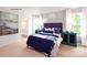 Spacious bedroom with blue accents, featuring ample natural light and stylish decor at 1348 Secrest Commons Dr, Monroe, NC 28112