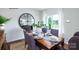 Bright dining room with a large window, wood table, and seating for six at 1348 Secrest Commons Dr, Monroe, NC 28112