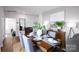 Stylish dining room with hardwood floors, a buffet, and seating for six at 1348 Secrest Commons Dr, Monroe, NC 28112