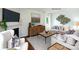 Cozy living room features a fireplace, stylish furniture, and decorative accents at 1348 Secrest Commons Dr, Monroe, NC 28112