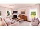 Inviting living room with a fireplace, hardwood floors, and comfortable seating at 1348 Secrest Commons Dr, Monroe, NC 28112