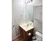 Bathroom features a vanity with mirror, toilet, and a cabinet with storage at 140 Marakery Rd # C, Mooresville, NC 28115