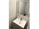 Powder room featuring a stylish vanity with modern fixtures and a large mirror at 140 Marakery Rd # C, Mooresville, NC 28115