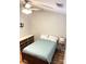 Cozy bedroom with a double bed, side table with lamp, ceiling fan, and dresser at 140 Marakery Rd # C, Mooresville, NC 28115