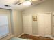 Bedroom with two closets and a window, offering ample storage and natural light at 140 Marakery Rd # C, Mooresville, NC 28115