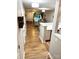 Open-concept living space with hardwood floors, recessed lighting, and access to the backyard at 140 Marakery Rd # C, Mooresville, NC 28115