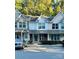 Charming townhouse exterior with brick accents, well-kept landscaping, and inviting entrance at 140 Marakery Rd # C, Mooresville, NC 28115