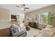 Comfortable living room with an open concept view to the kitchen and dining area at 147 Stanfield Farm Ln, Stanfield, NC 28163