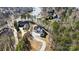 An aerial view of the property, showing the home’s location near the lake and surrounding trees at 154 Fox Hunt Dr, Mooresville, NC 28117