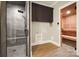 Modern bathroom featuring a tiled shower, laundry hookups, storage cabinets and sauna at 154 Fox Hunt Dr, Mooresville, NC 28117