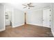 Bedroom featuring a ceiling fan, hardwood floors, white trim and natural light at 154 Fox Hunt Dr, Mooresville, NC 28117