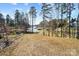 Lakeside lot with views of the water, boat docks, and distant homes at 154 Fox Hunt Dr, Mooresville, NC 28117