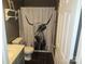 Bathroom includes shower and tub with quirky highland cow shower curtain and sleek dark flooring at 1638 Marmot Pl, Concord, NC 28025