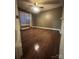 Bedroom featuring hardwood floors, neutral paint and a large window at 1638 Marmot Pl, Concord, NC 28025