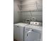 Laundry area with a set of white Maytag washer and dryer units at 1638 Marmot Pl, Concord, NC 28025