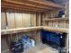 Shed interior equipped with shelves and a Kobalt rolling tool chest at 1638 Marmot Pl, Concord, NC 28025
