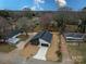Aerial view of a newly built home with a modern design and a spacious landscaped yard at 205 Skyline Cir, Salisbury, NC 28146