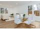 Open floor plan combining the dining and living areas, with a glass table and seating for six at 205 Skyline Cir, Salisbury, NC 28146