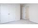 Bedroom featuring neutral walls and carpet, a double door closet, and ample natural light at 2058 Skyhawk Dr, Lake Wylie, SC 29745
