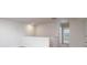 Upstairs hallway with carpet and white walls leading to other rooms of the home at 2058 Skyhawk Dr, Lake Wylie, SC 29745