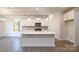 Spacious kitchen featuring an island, stainless appliances, and lots of cabinet space at 2058 Skyhawk Dr, Lake Wylie, SC 29745