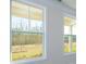 Bright and airy room features large window with beautiful view of the outdoors at 2058 Skyhawk Dr, Lake Wylie, SC 29745