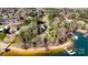 Waterfront estate boasts a main house, pool, dock, and beautiful lake access at 20711 Bethel Church Rd, Cornelius, NC 28031
