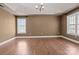 Spacious bedroom features a trey ceiling, hardwood floors, and natural light at 214 Harbor Landing Dr, Mooresville, NC 28117