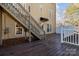 Rear elevated deck featuring stairs to the backyard, and a partial privacy wall at 214 Harbor Landing Dr, Mooresville, NC 28117