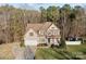 Attractive home with a two-car garage, well-kept lawn, and beautiful landscaping at 214 Harbor Landing Dr, Mooresville, NC 28117