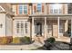 Classic front entrance with white columns and beautiful landscaping at 214 Harbor Landing Dr, Mooresville, NC 28117