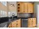 This cozy kitchen features stainless steel appliances, granite countertops, and ample cabinet space at 214 Harbor Landing Dr, Mooresville, NC 28117