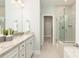 Bathroom featuring a double vanity, granite countertop, a glass enclosed shower, and tile flooring at 2150 Millennium Dr # 094, Lancaster, SC 29720