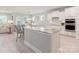Modern kitchen showcasing a central island, white cabinetry, and stainless steel appliances at 2150 Millennium Dr # 094, Lancaster, SC 29720