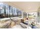 Relaxing front porch with rocking chairs and covered area at 308 W Charlotte Ave, Mount Holly, NC 28120