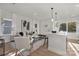 Open-concept living space that flows with the kitchen, featuring modern decor and a comfortable seating area at 3314 Cedarhurst Dr, Charlotte, NC 28269